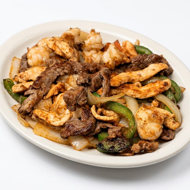 3 Way Steak, Chicken And Shrimp Fajitas.